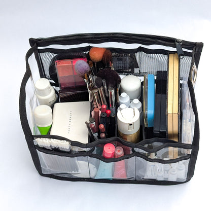 PVC insert for Moth Pro bag, wide interior view with multiple compartments packed with kit essentials
