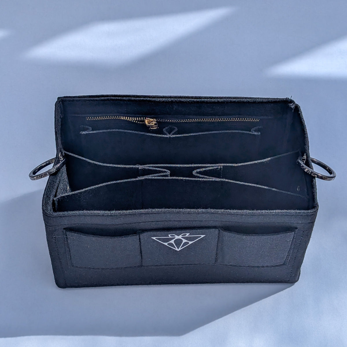Felt insert for Moth Pro bag, open view showing the internal zip pocket and front pocket with Moth logo
