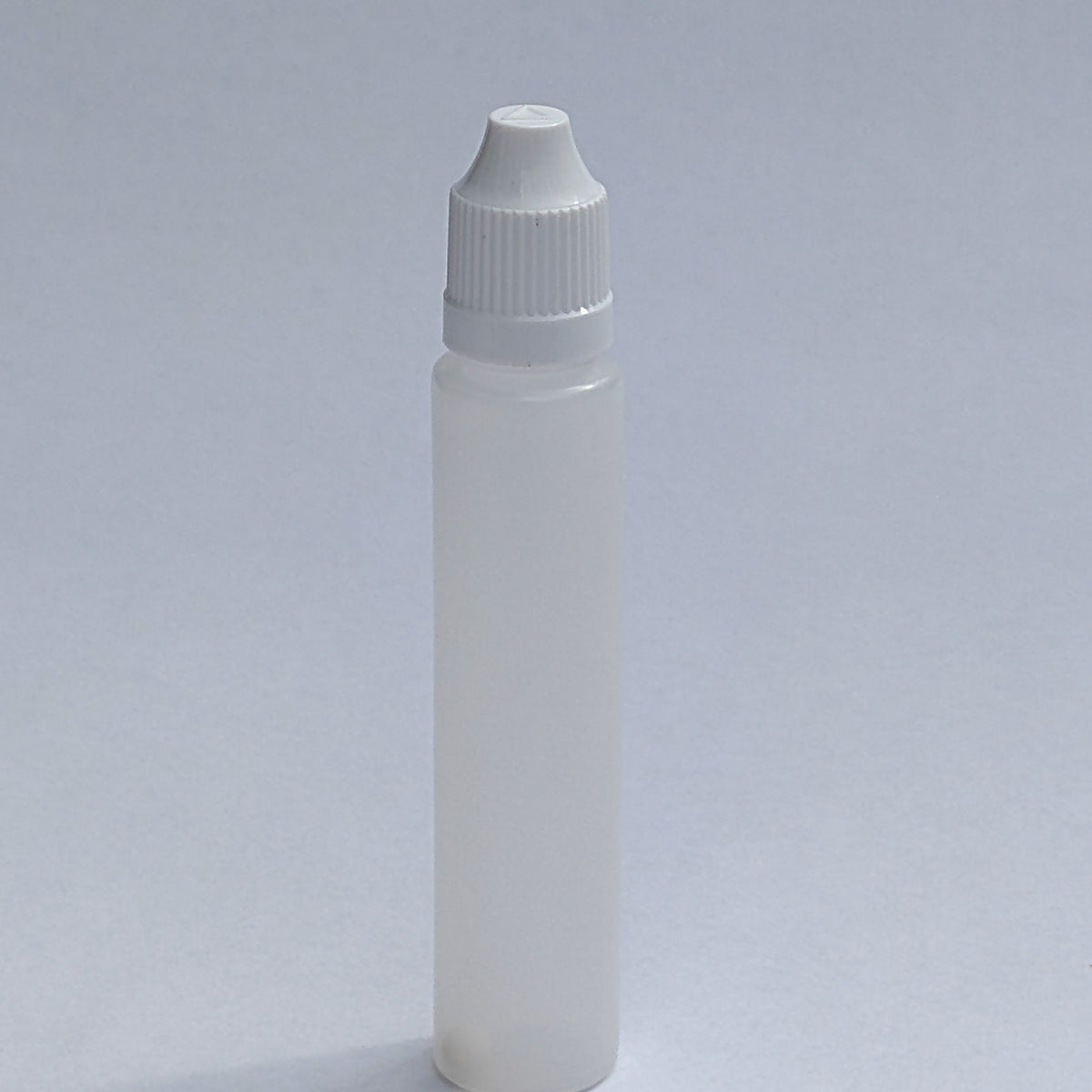Single long dropper bottle standing upright, full body view