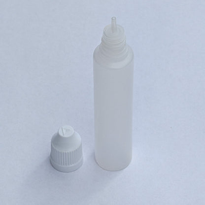 Long dropper bottle with cap removed, showing the fine nozzle tip