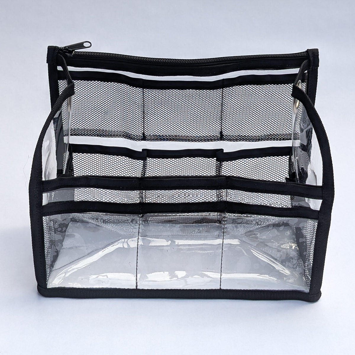 Empty PVC insert for Moth Pro bag, straight-on front view showing the mesh divider rows