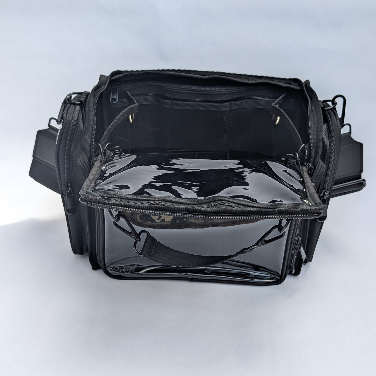 Moth Pro set bag with the front drop-down panel unzipped and lowered flat