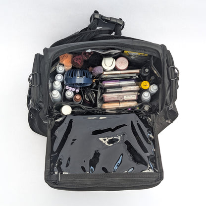 Moth Pro set bag filled with cosmetics and accessories, photographed from above on a plain white background.